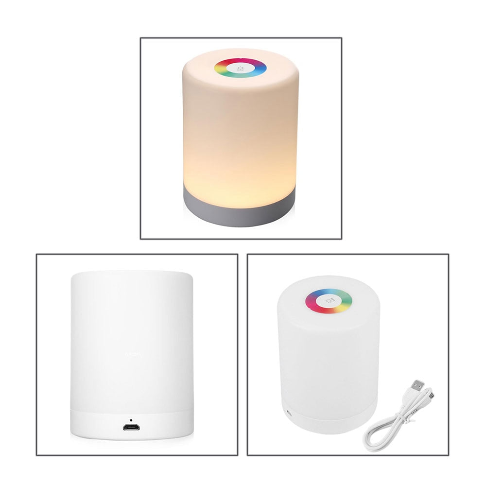 Elegant designet LED berøringslampe med varmt lys, fungerer som en moderne nattlampe og dekorasjon.