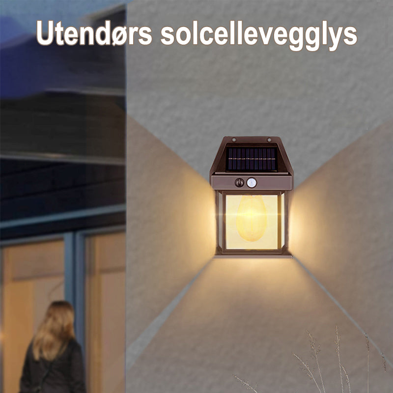 Solcelledrevet utendørs vegglampe med LED, robust metallkropp, smart sensor, IP65, ideell for terrasser og hager.