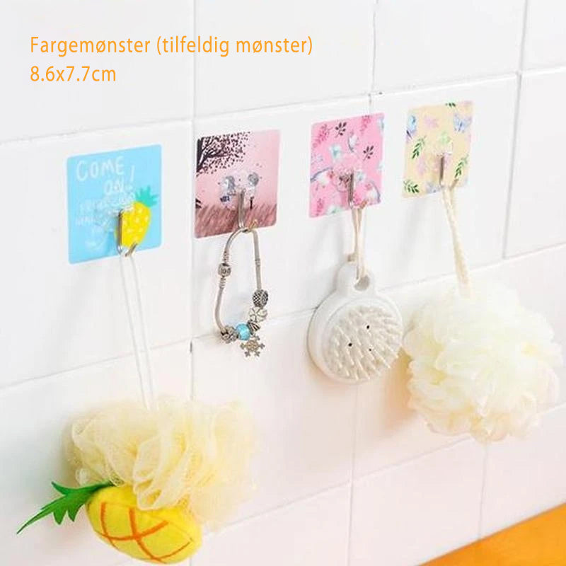 "Sømløs, selvklebende krok i rustfritt stål og transparent PVC; perfekt for glatte overflater i moderne hjem."