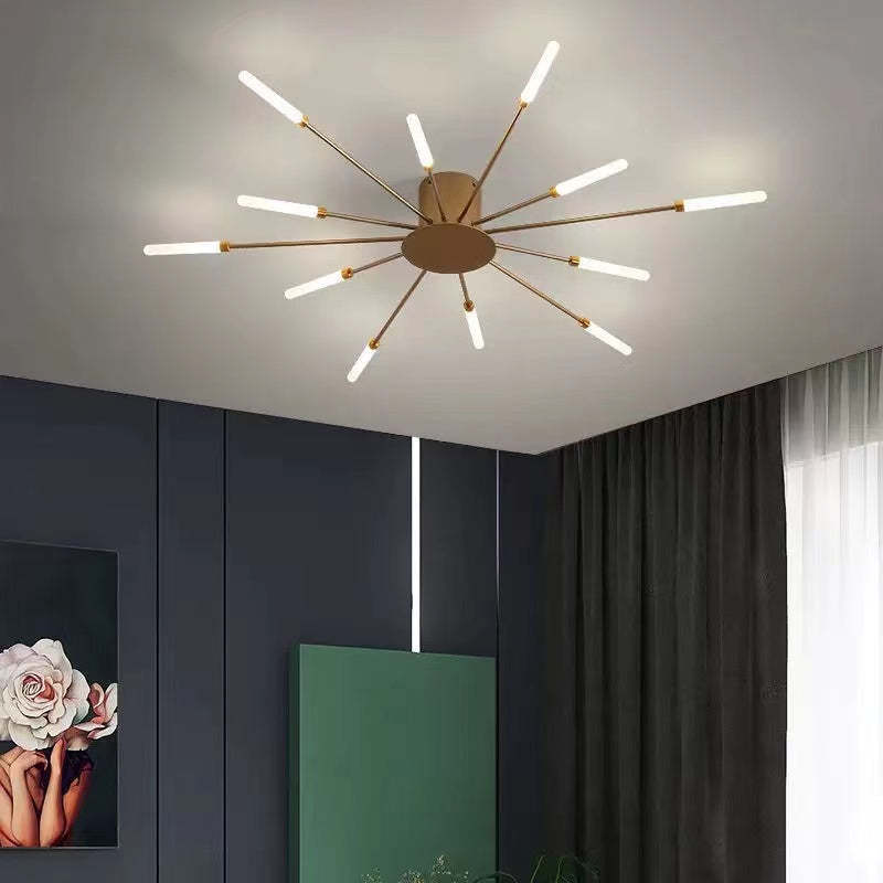 "Stilfull metallisk taklampe med LED-lys og fyrverkerimønster, tilgjengelig i gull og svart, for moderne hjem."