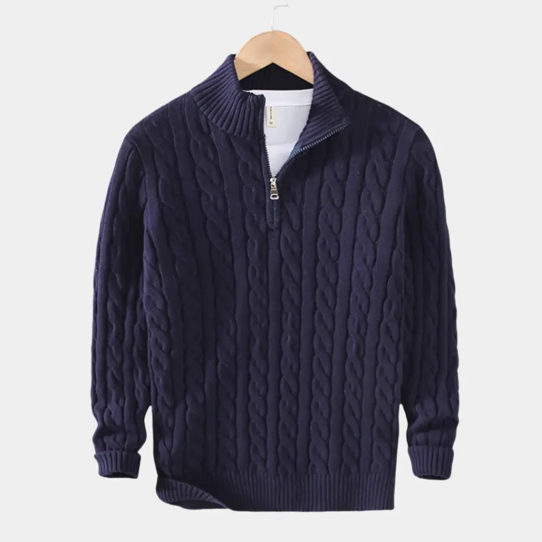Nærbilde av herregenser med halv glidelås. Detalj av stoff og glidelås for en elegant look.
