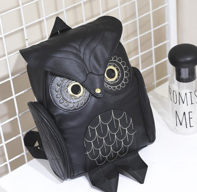 Vintage-inspirert ugle ryggsekk i slitesterkt skinn, egnet som reisebag