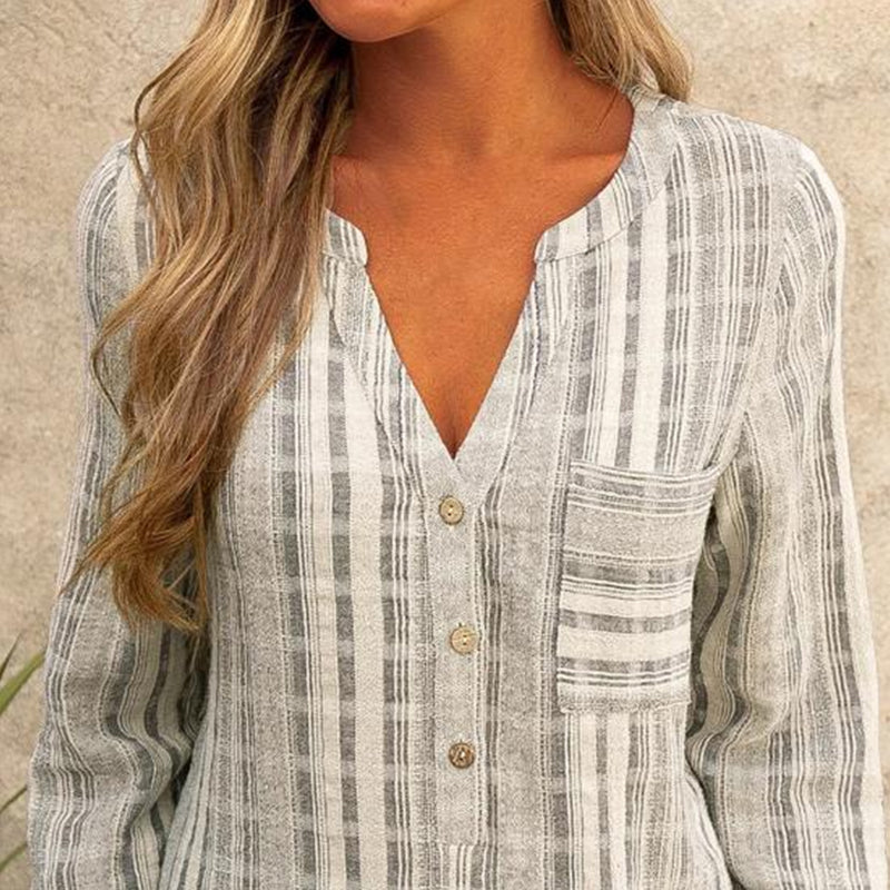 "Stripete langermet bluse med V-hals, uformelt design, viser horisontale striper og lange ermer, perfekt for vår/høst."
