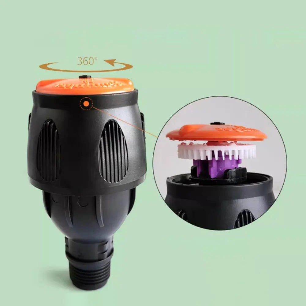 Svart, roterende hagesprayer som automatisk vanner plenen og hagen effektivt. Robust hageutstyr 360°.