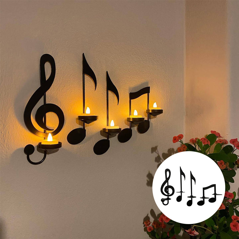 "Svart musikknote veggstake i metall, elegant design med G-nøkkel og kvartnote, perfekt for moderne hjemdekor."