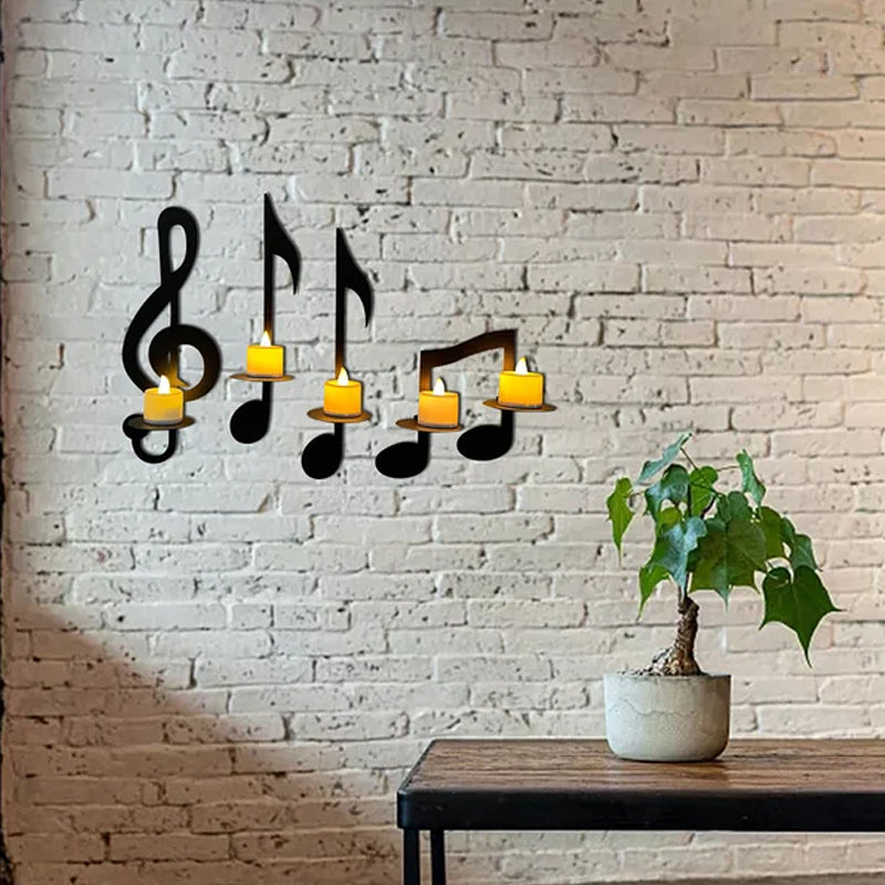 "Svart musikknote veggstake i metall, elegant design med G-nøkkel og kvartnote, perfekt for moderne hjemdekor."