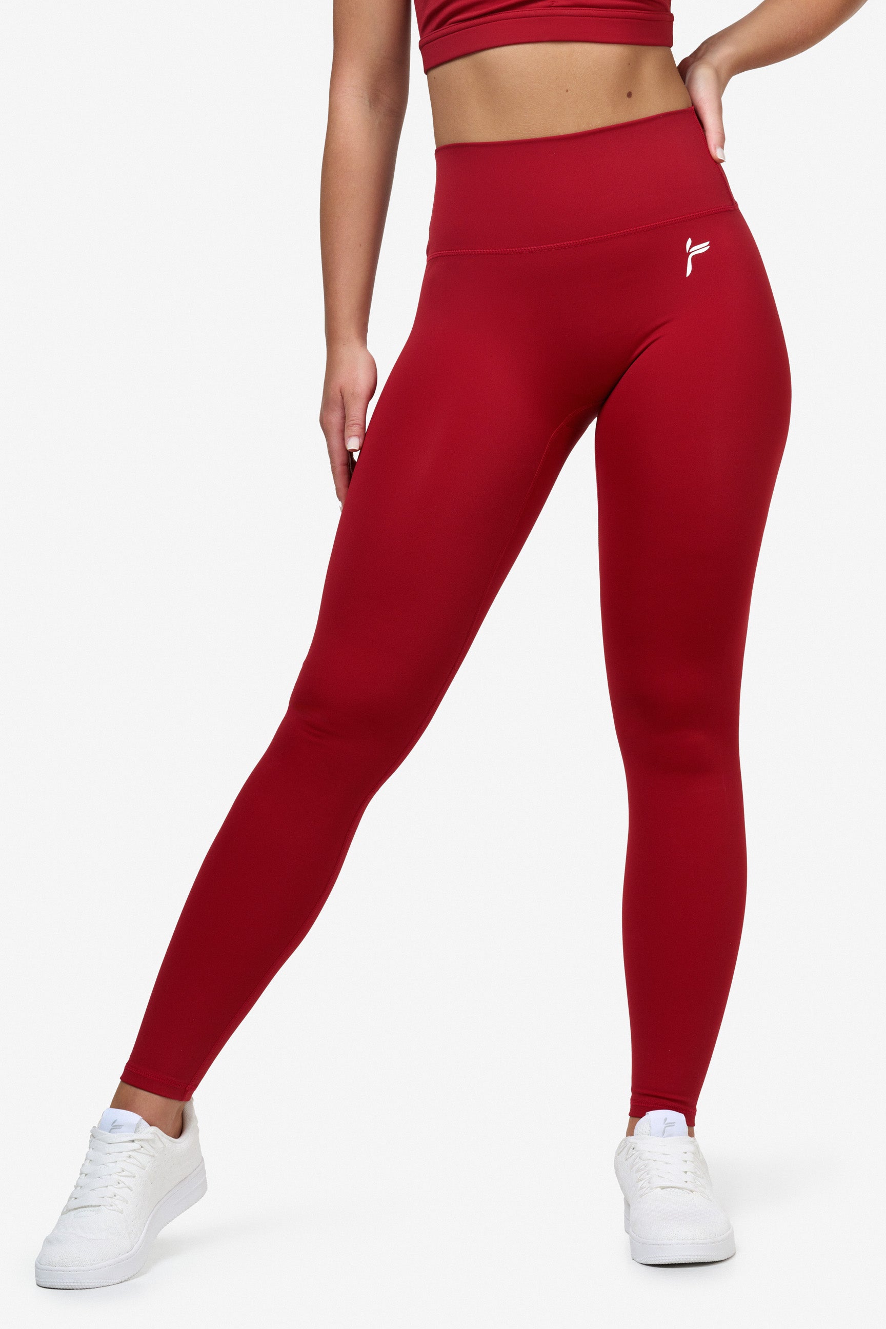"Svart scrunch-effekt leggings med høyt liv for optimal passform og komfort under trening, sett på modell."
