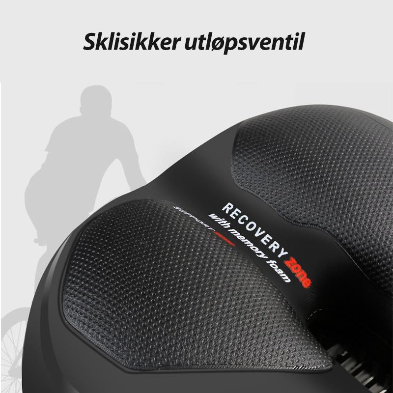 "Sykkel setepute i myk silikon med pustende design, uthevet i blått med luftehull for maksimal komfort på lange turer."