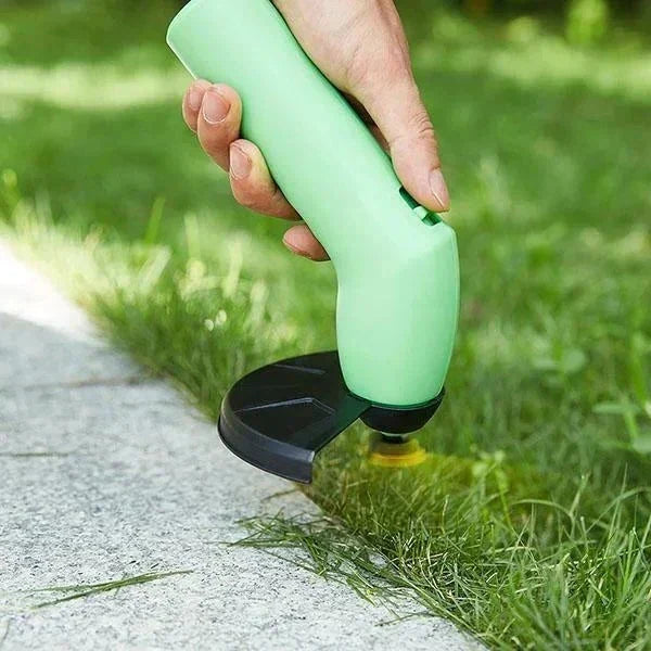 Oppladbar, grønn minigressklipper, trådløs frihet for effektiv plenpleie og detaljert trimming.