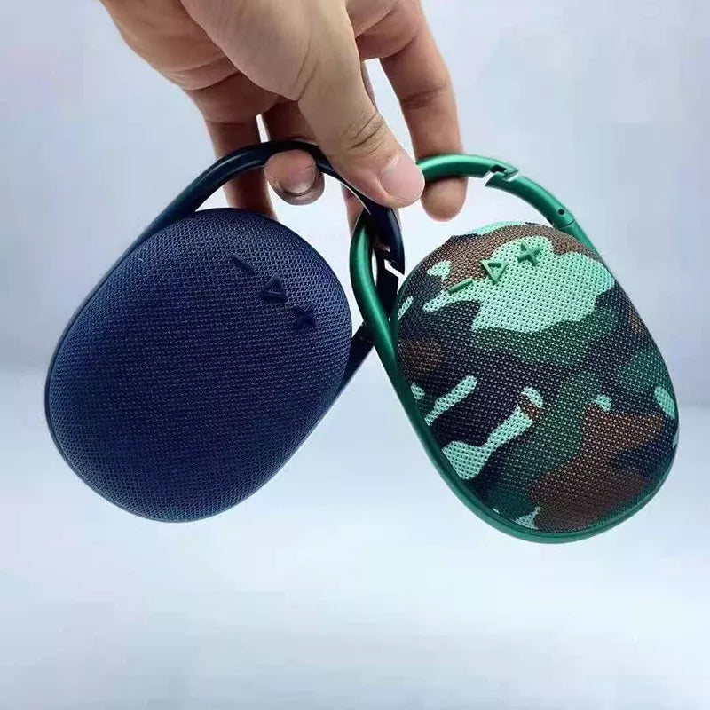 "Trådløs Bluetooth-høyttaler med kraftig bass, kompakt design, bærbar, i flere farger som blå, grå og svart"