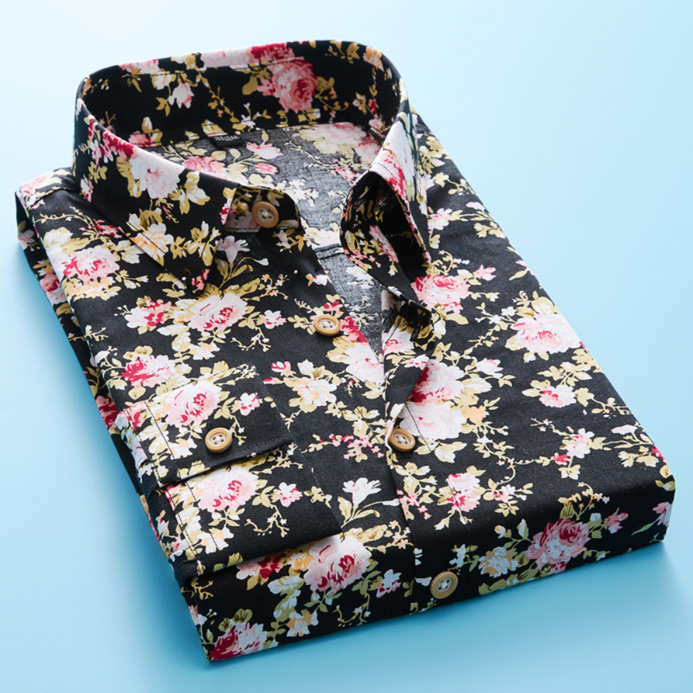 Komfortabel kortermet herreskjorte med blomstermønster. Bomullsblanding, perfekt for casual sommerferie.