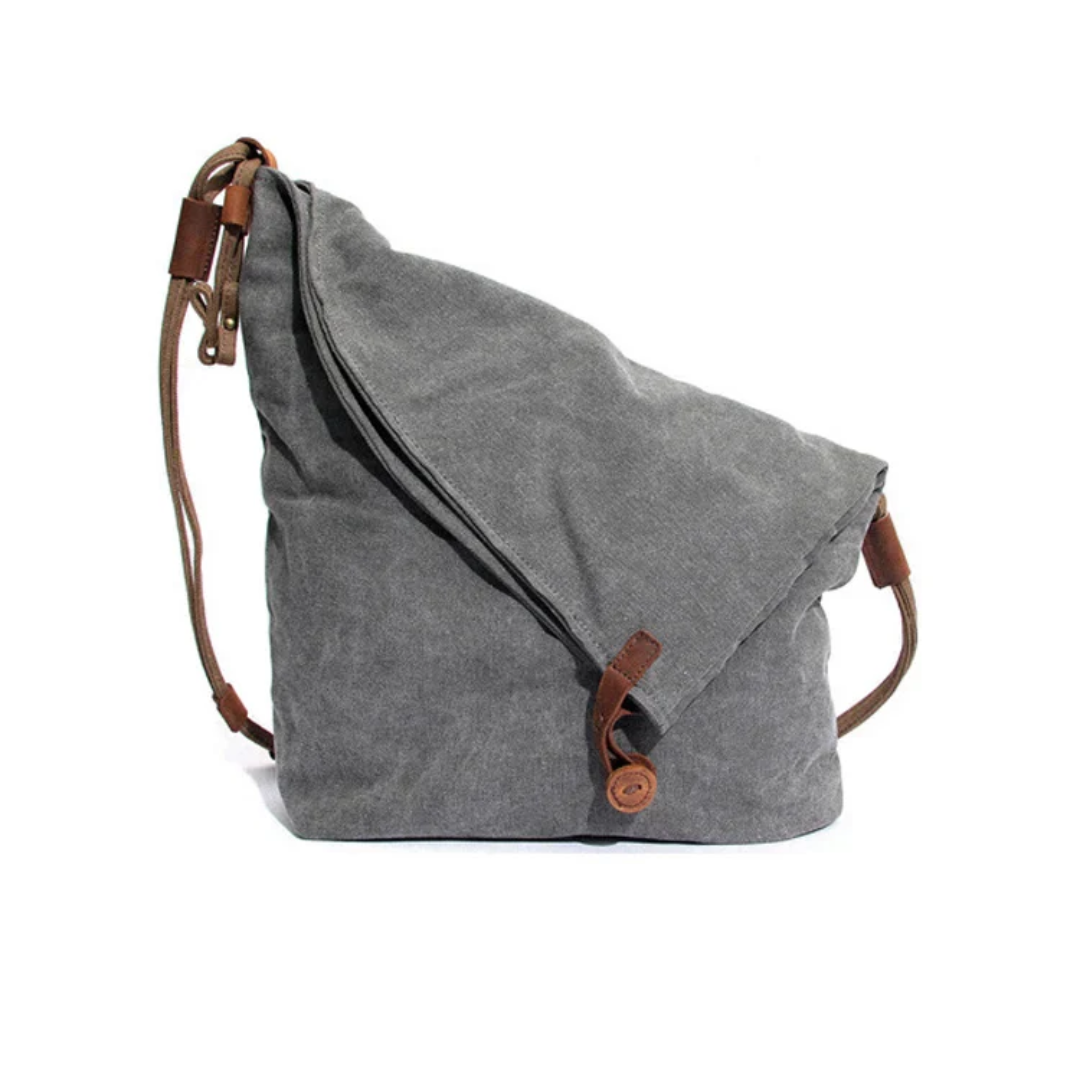 Elegant dameveske med glidelås, romslig interiør og trendy design. Ideell som hverdagsveske i grå eller beige.