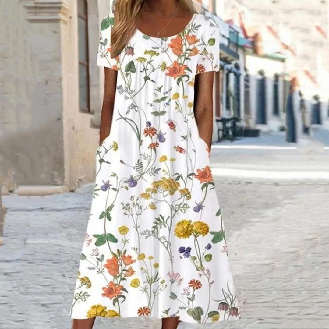 "Uformell sommerkjole med blomsterprint i myk polyester, stråler sommerlig eleganse, perfekt for varme dager og allsidige anl