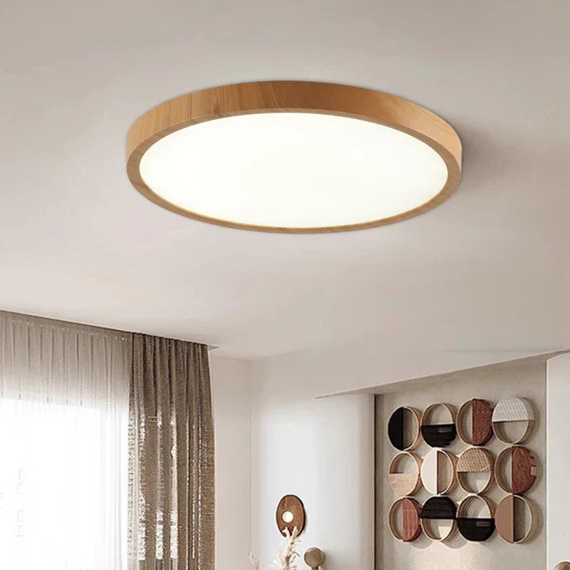 "Ultratynn sirkulær taklampe med justerbare lyseffekter og elegant valnøttdesign for moderne interiør."