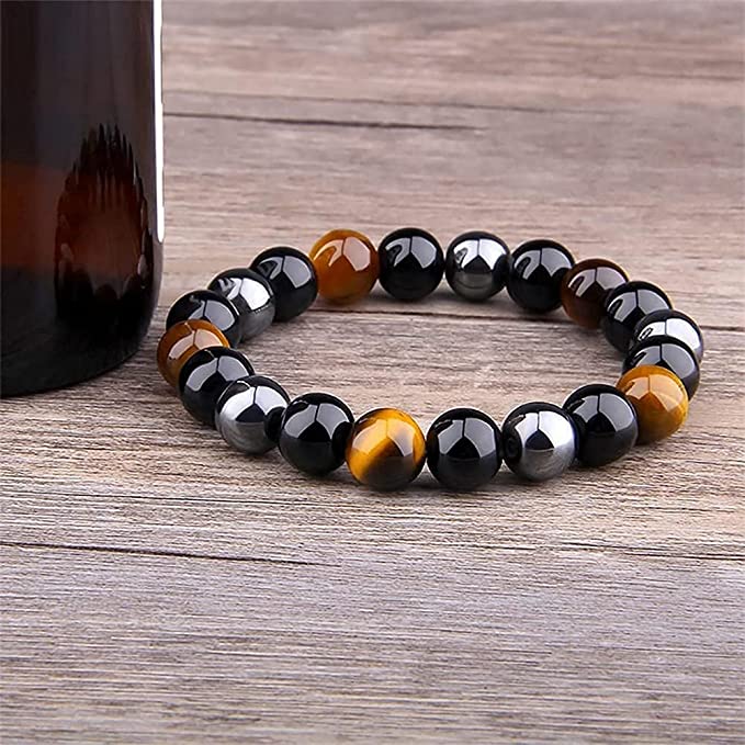 Elegant perlearmbånd med polerte tigerøye, obsidian og hematitt edelstener, unisex design.