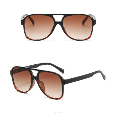 Elegante unisex aviator solbriller i bronsefarge, med kontrastfargede glass, essensiell UV400.