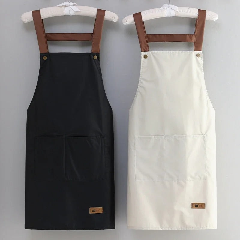 Allsidig unisex forkle; vanntett og smussbestandig. Egnet for matlaging, baking og grill.