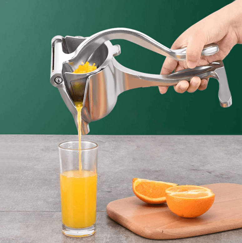 Ergonomisk manuell sitruspresse og fruktpresse for enkel og sunn juicelaging hjemme.