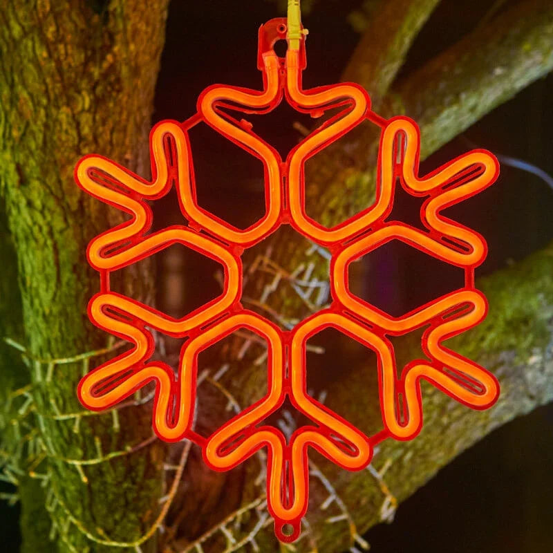 Vanntett utendørs LED-snøfnugglys med glødende snøfnugg i fall, IP65, flere farger, perfekt for juledekorasjon.