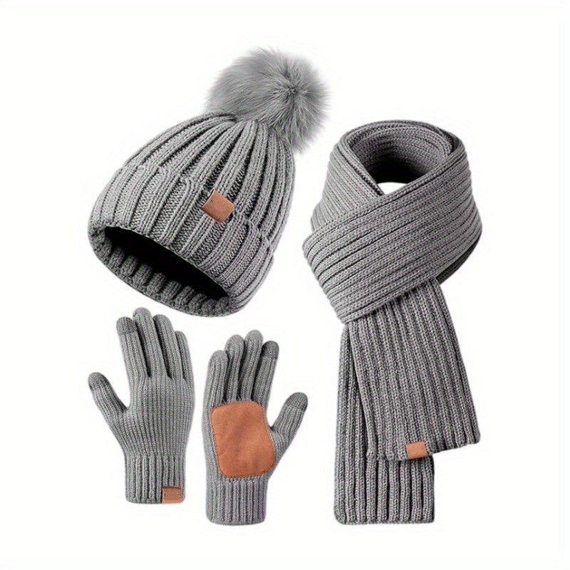 Elegant strikket vintersett for kvinner. Inkluderer beanie, skjerf og hansker med berøringsskjermfunksjon.