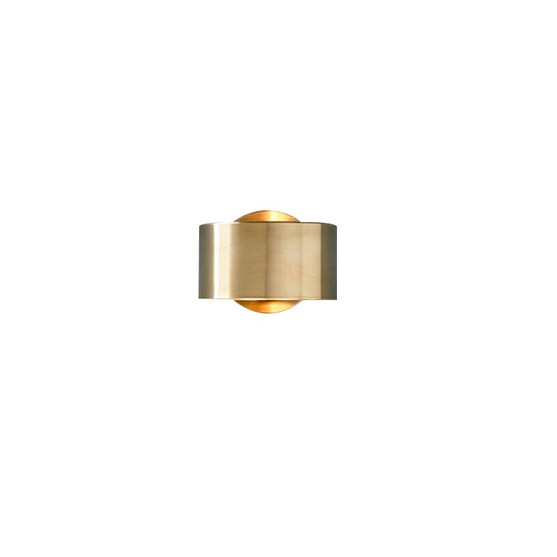 "Vegglampe med jernspiral design, elegant belysning i gull og svart, perfekt for moderne interiør."