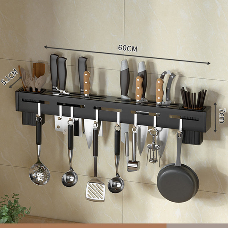 Elegant veggmontert knivholder for kjøkken. Moderne design som sparer plass og organiserer kjøkkenutstyr.