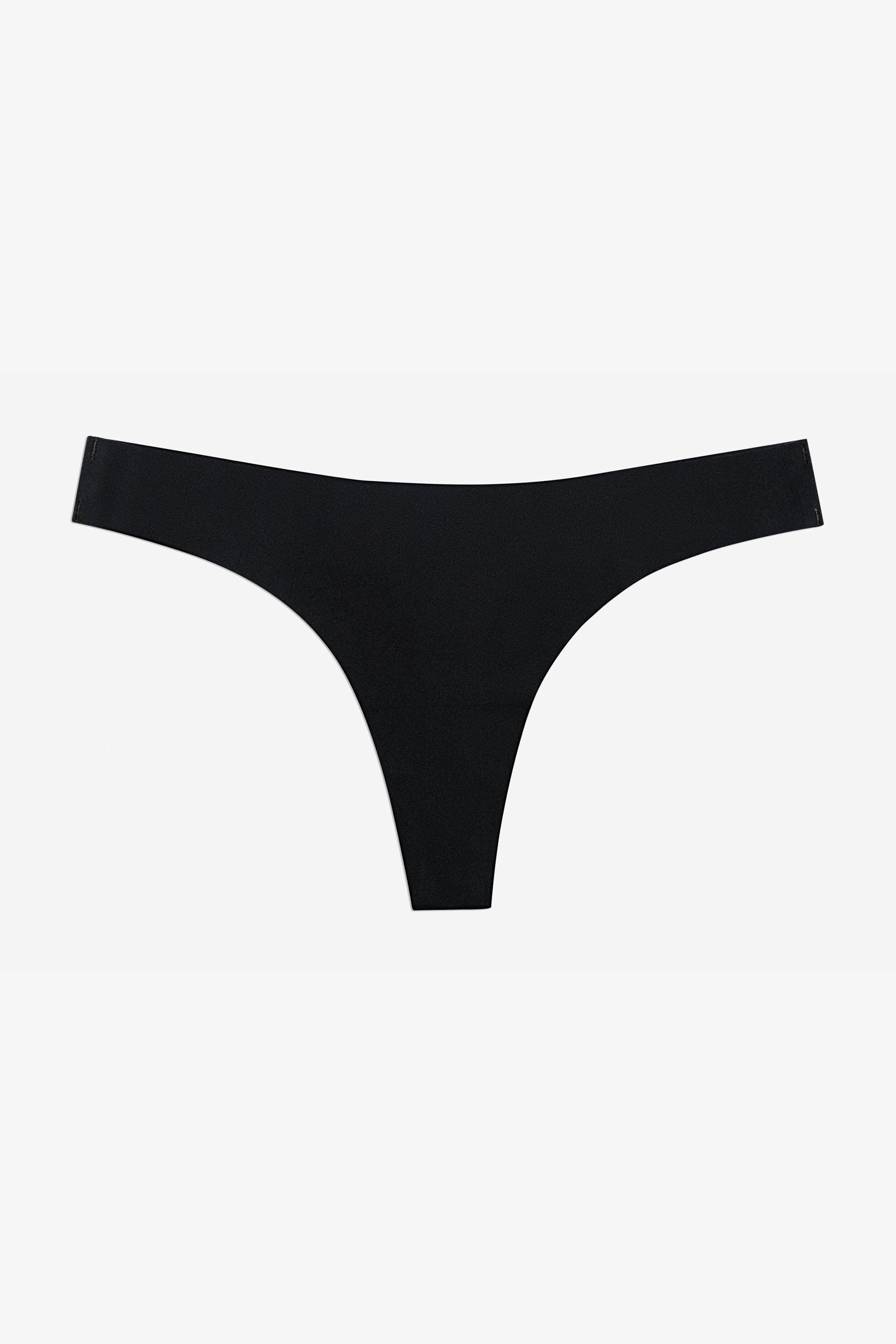 "3-pack sømløse tynne stringtruser i elastisk, mykt stoff i beige, sort og hvit uten synlige kanter, komfortabel passform"