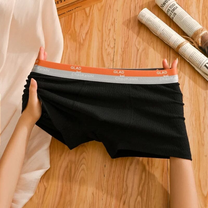 "Antibakteriell herreboksershorts i bomull, svart, pustende og komfortabel, med elastisk passform og klassisk design."