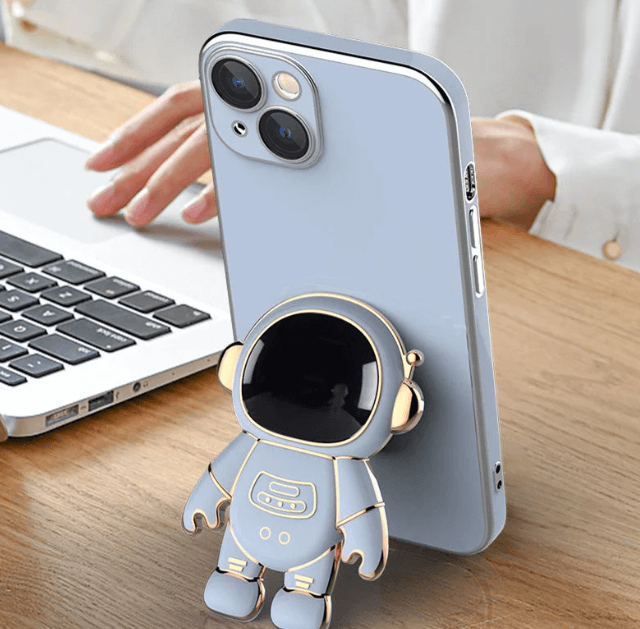 Slitesterkt silikon/TPU-deksel med astronaut-design for iPhone. Gir optimal beskyttelse og et lekent preg.