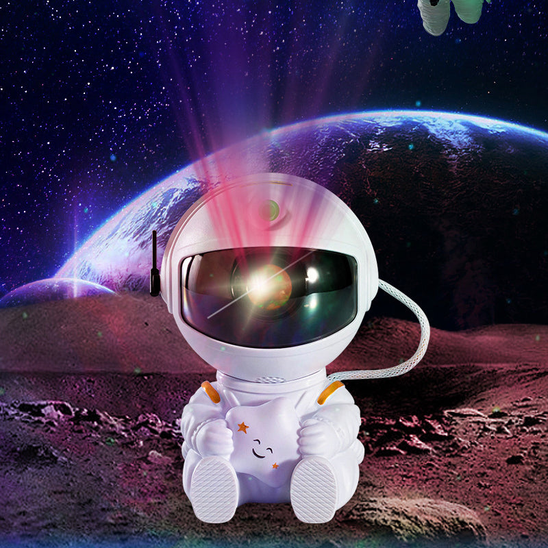 "Astronautformet stjerneprojektor med justerbart hode, projiserer stjernehimmel for beroligende romtemaopplevelse."