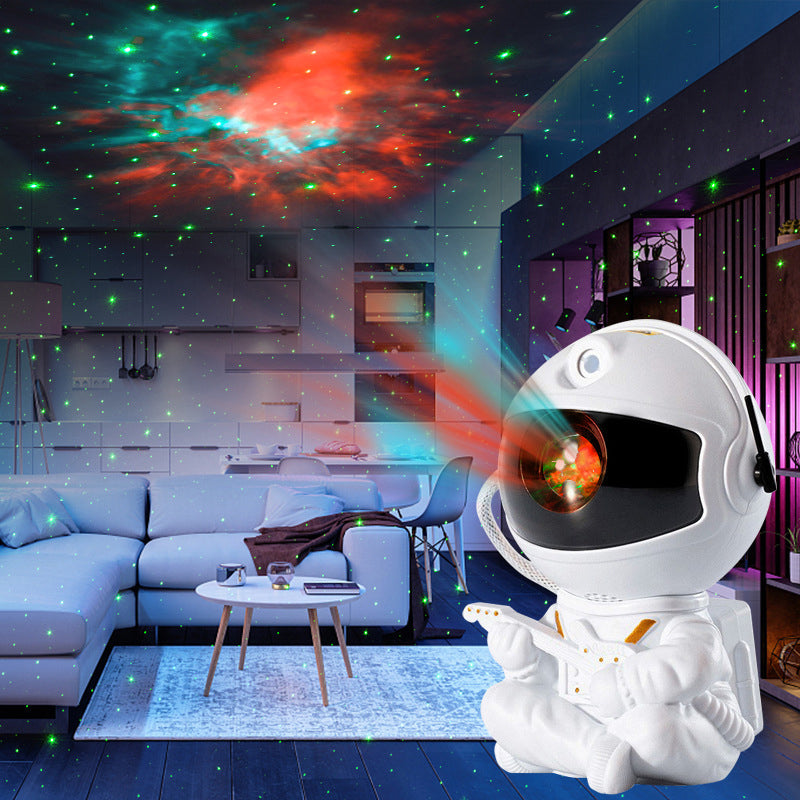 "Astronautformet stjerneprojektor med justerbart hode, projiserer stjernehimmel for beroligende romtemaopplevelse."