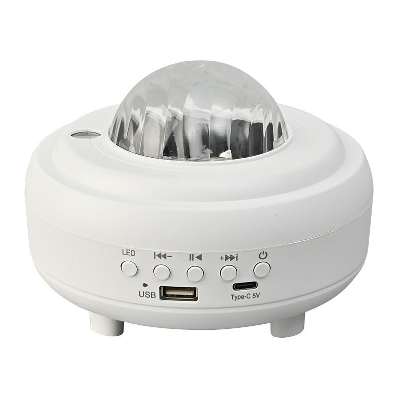 "Auroraprojektor med galakselys i rommet, elegant svart-hvitt design, Bluetooth-høyttaler for dynamisk lysopplevelse."
