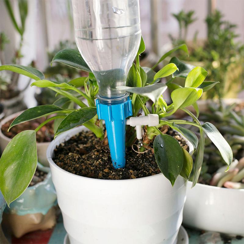 "Automatisk vanningssystem for planter, grønn plastkonstruksjon, enkel montering, justerbar vannmengde, miljøvennlig design."