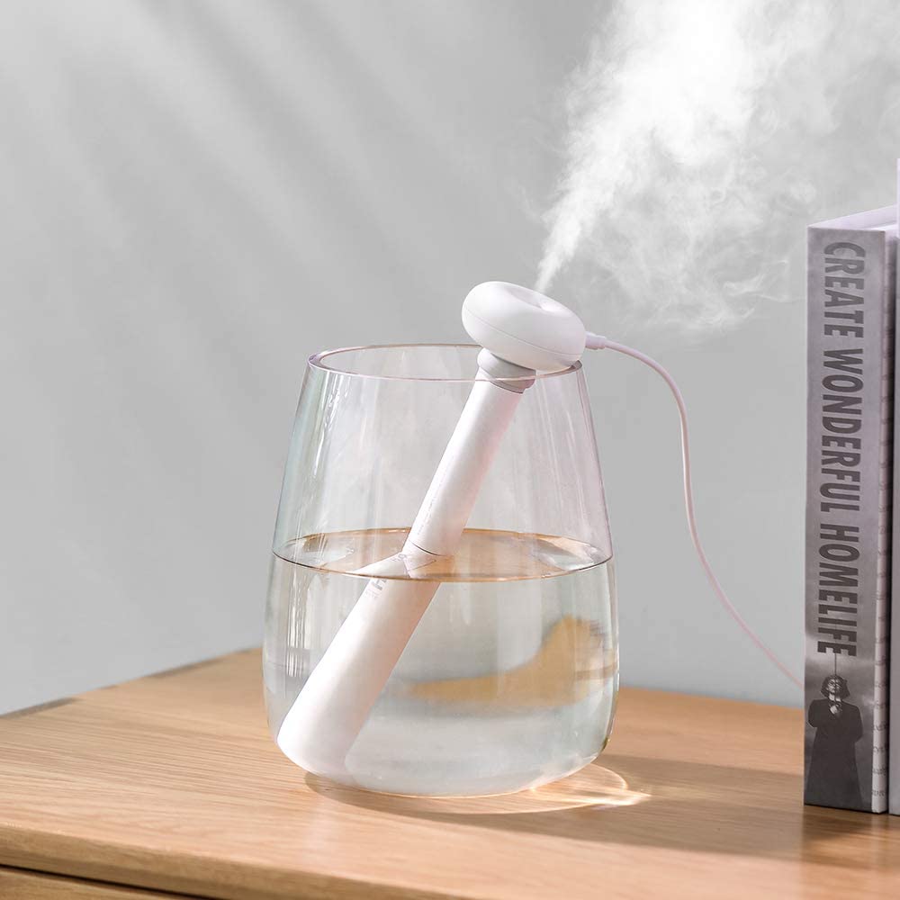 USB-luftfukter som forvandler vannflasker til en frisk luftkilde. Forbedrer inneklimaet og fuktigheten.