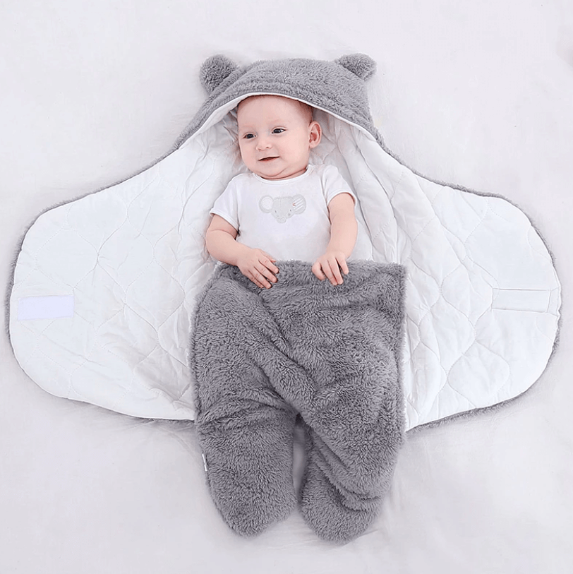 Babypledd sovepose med snøring, justerbar for optimal babykomfort.