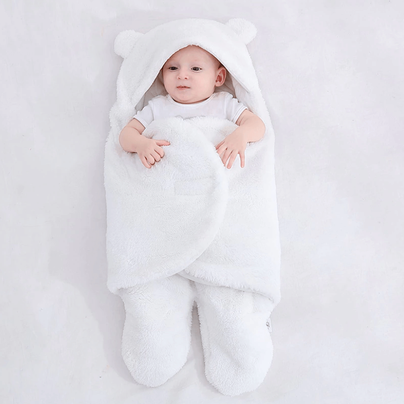 Babypledd sovepose sett opp, viser full lengde for nyfødt babyutstyr.
