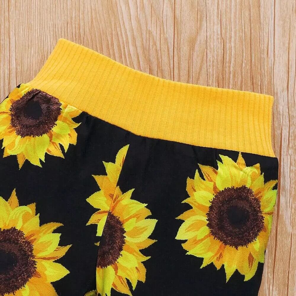 To-delt babysett med solsikkedesign, langermet overdel og bukse, egnet for både jenter og gutter