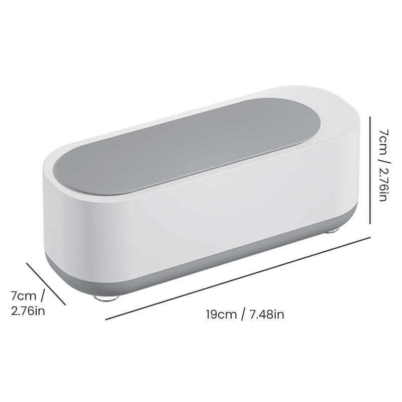 "Bærbar hvit og grå ultralydrensemaskin med høy kapasitet for smykker, briller og klokker, stillegående design."
