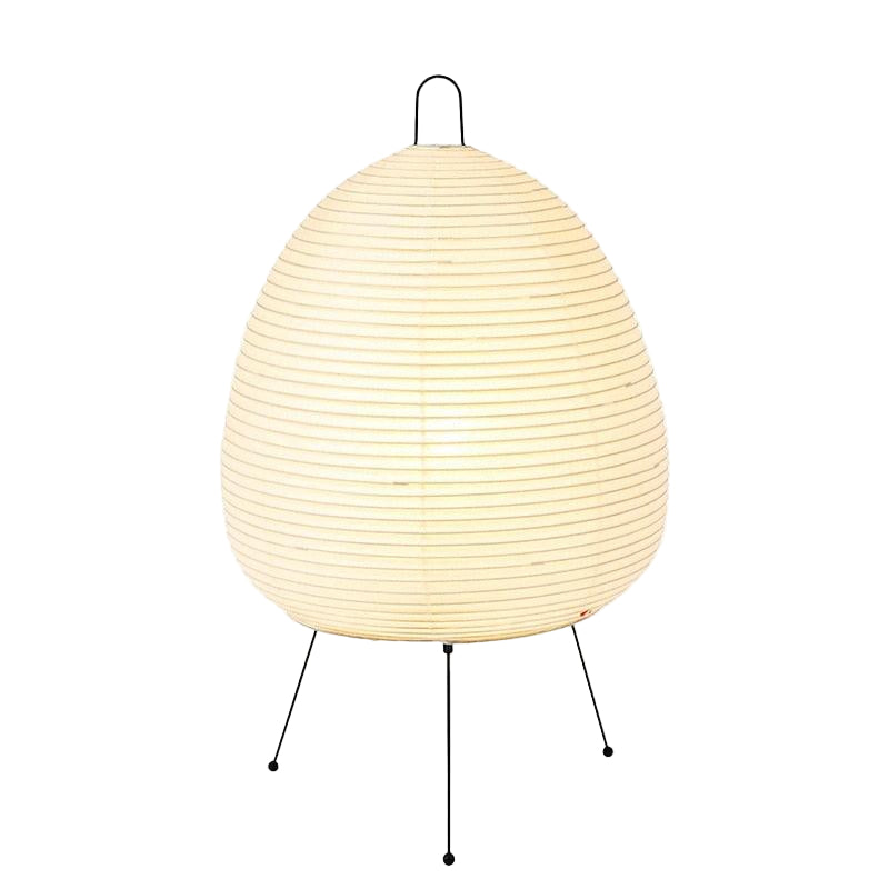Beige papirlampe med japansk design, gir mykt, koselig lys til stuen og skaper en avslappende atmosfære.