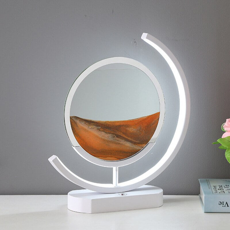 Stilren dekorlampe med hypnotiserende bevegelig sand og varm LED-belysning, beroliger.