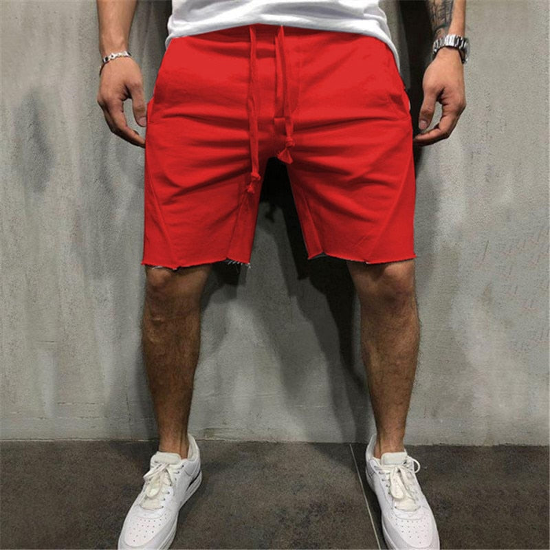 Allsidige beige herreshorts, ideelle for fritid og hverdagsbruk på varme sommerdager.