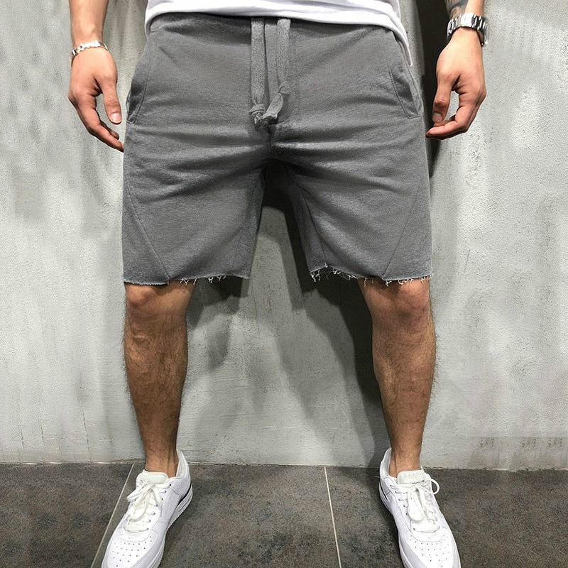 Grå casual shorts for menn. Ideell for hverdagsbruk og varme sommerdager, pustende stoff.