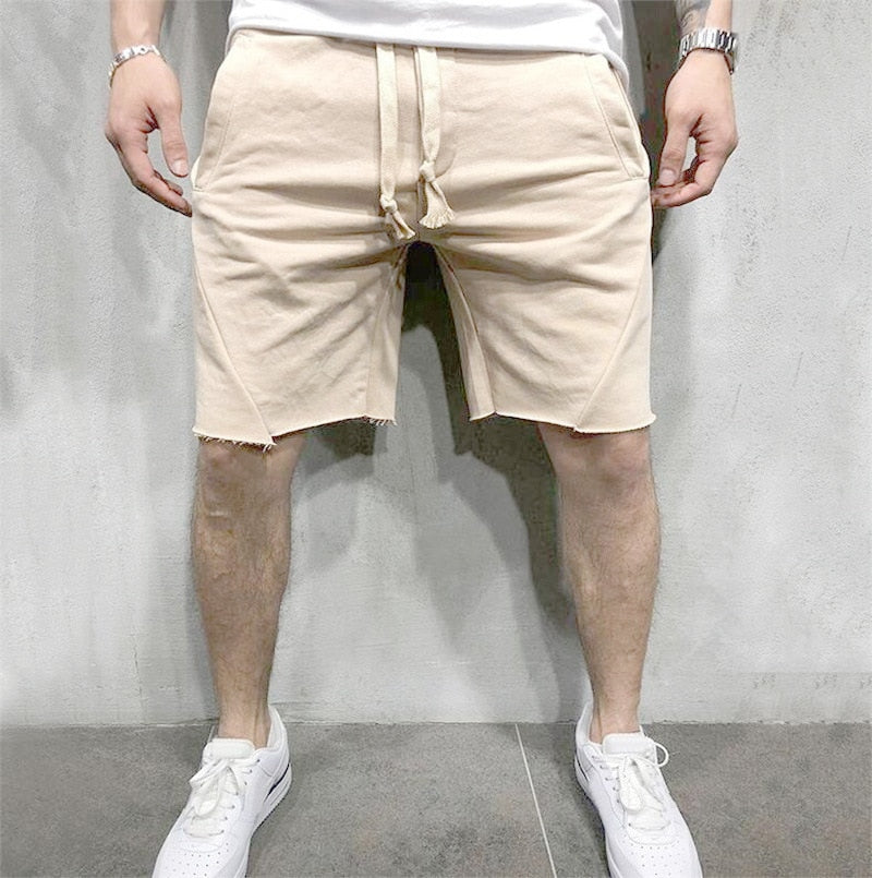 Avslappede blå herreshorts i pustende materiale. Optimal komfort og stil for sommeren.