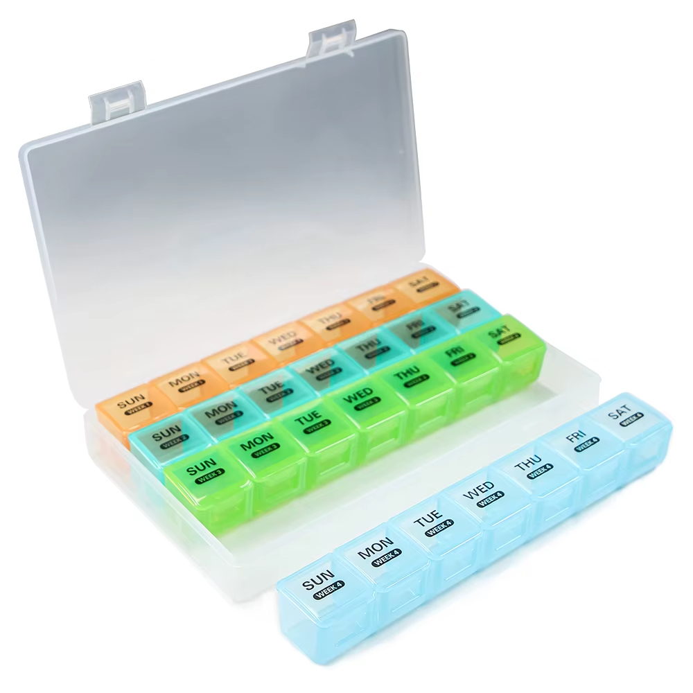 Kompakt pilleboks perfekt for reise, organiserer medisiner og vitaminer for ukesbruk. BPA-fri.