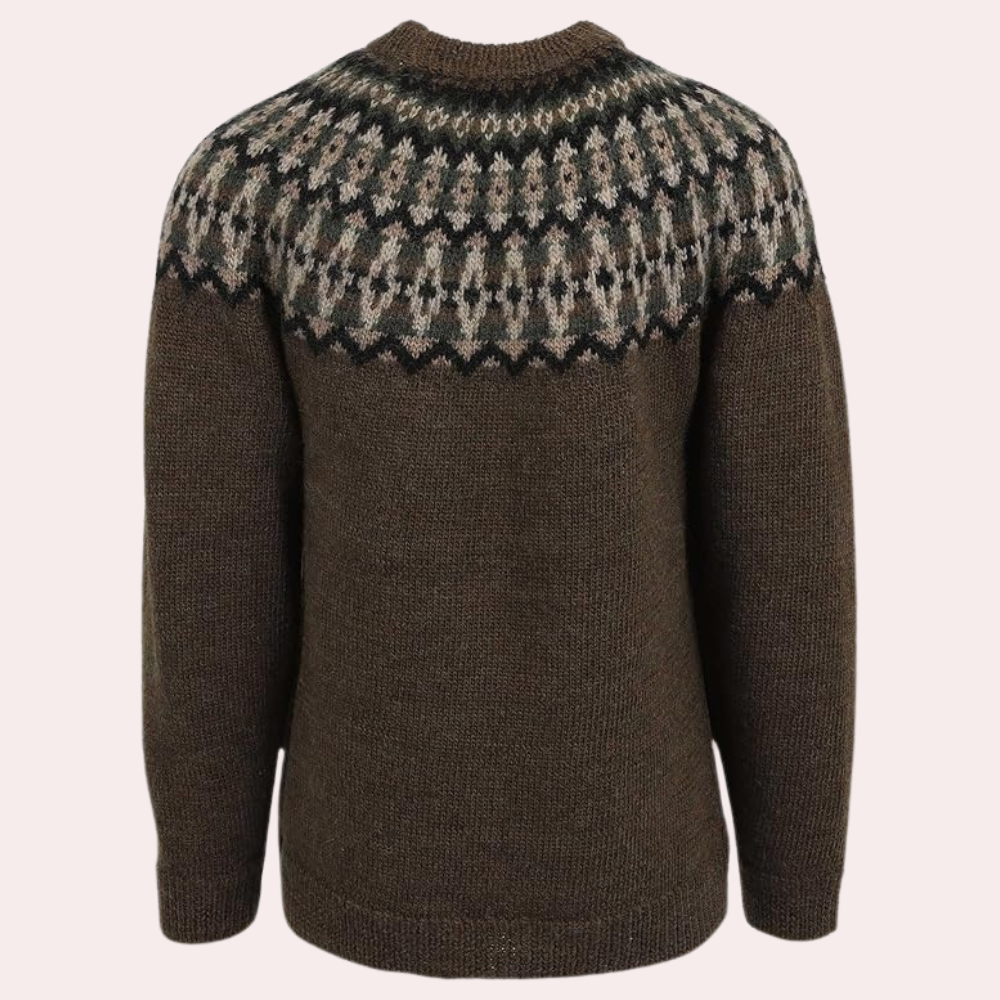 "Brun retrogenser for kvinner med tradisjonelt norsk mønster, rund hals og lange ermer. Perfekt for koselige vinterdager."