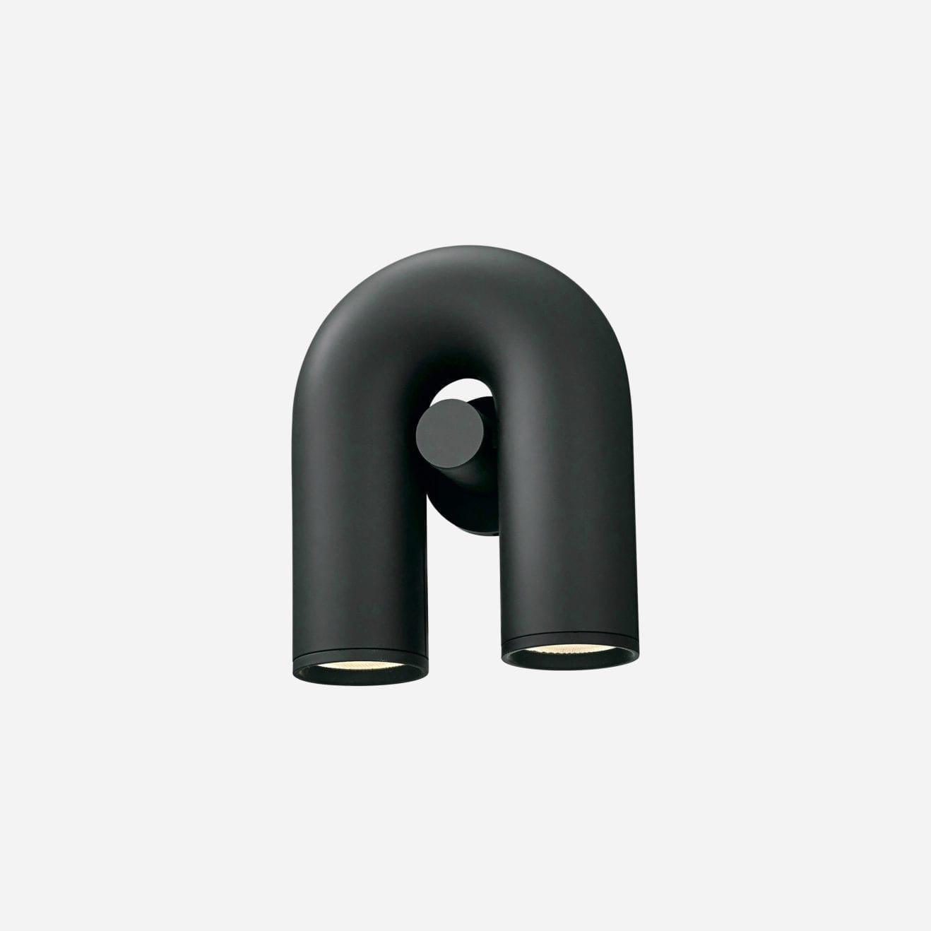 "Cirkus justerbar LED vegglampe med U-formet modul, elegant design for moderne innendørs belysning."