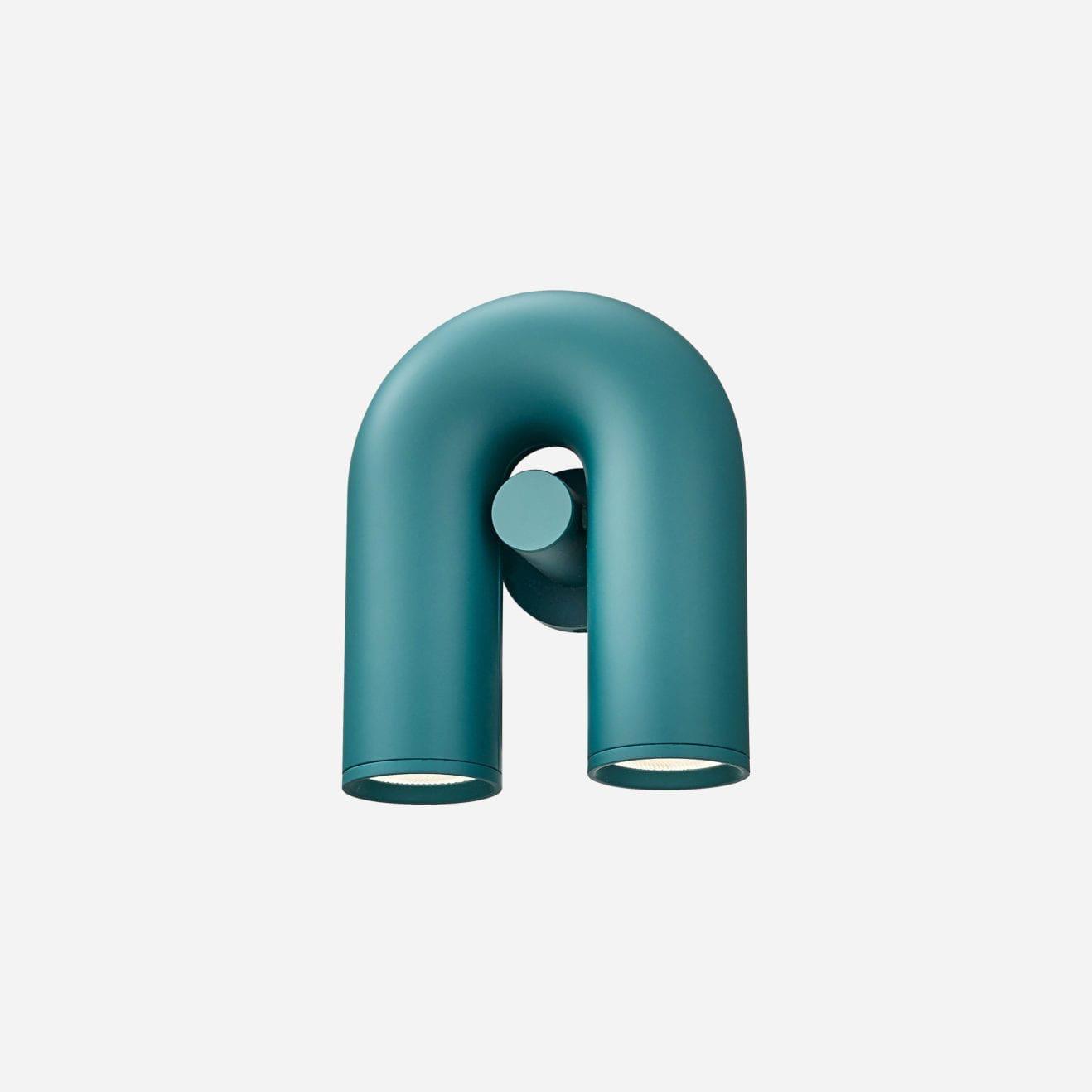 "Cirkus justerbar LED vegglampe med U-formet modul, elegant design for moderne innendørs belysning."