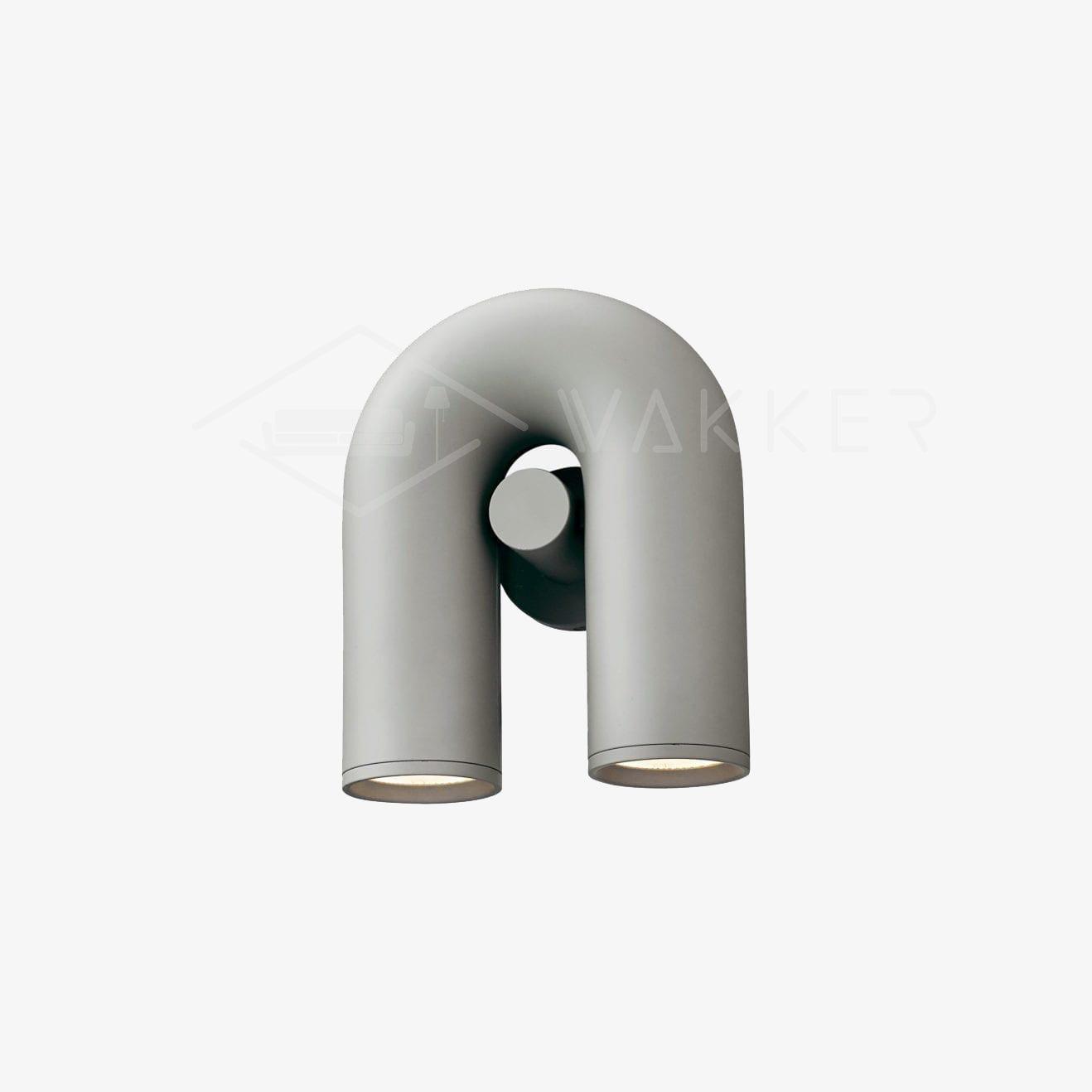 "Cirkus justerbar LED vegglampe med U-formet modul, elegant design for moderne innendørs belysning."