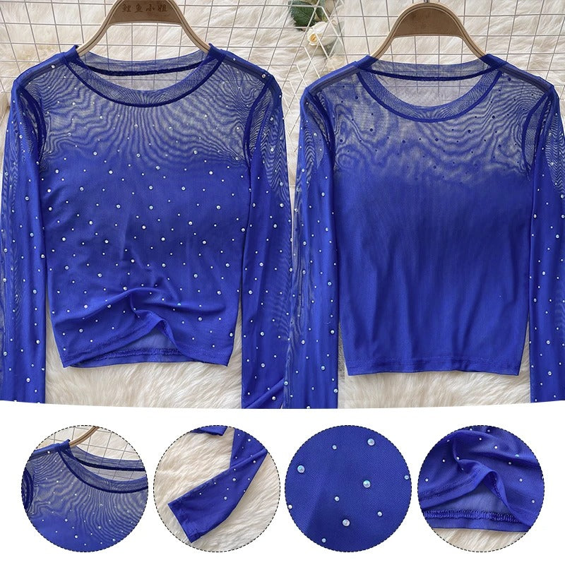Elegant dame crop topp med glitrende rhinestones og lange ermer, trendy design.
