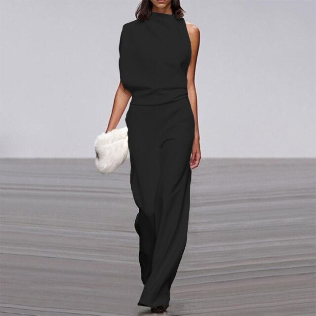Komfortabel dame jumpsuit, ermeløs og løs. Ensfarget kvinneoverall, perfekt for sommer og avslappet stil.
